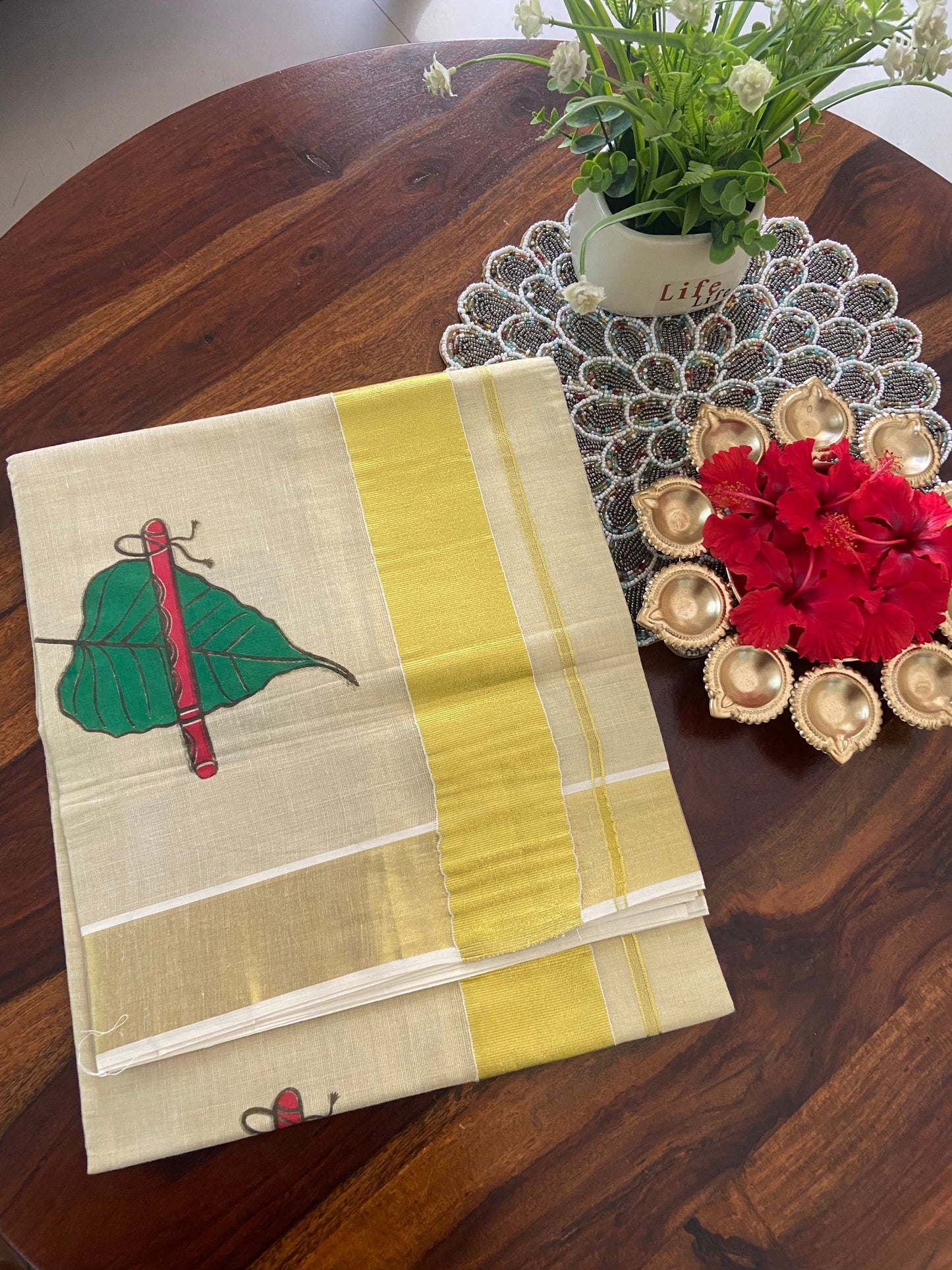 Kerala Kasavu saree with handblock printed