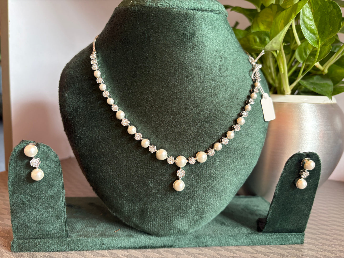 Pearl and white ad stone necklace