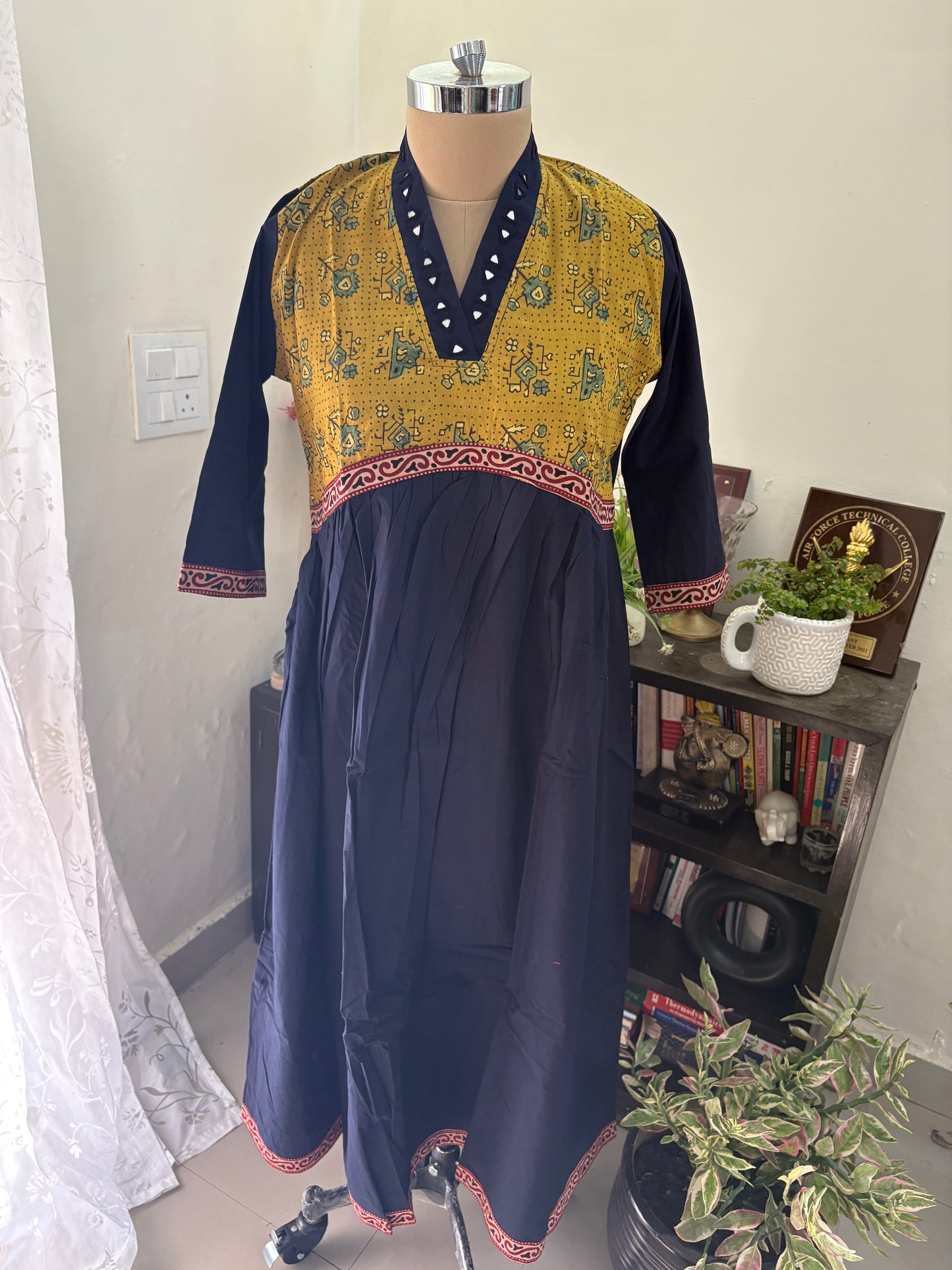 Ajrakh Handblock printed long Kurti with hand mirror work.