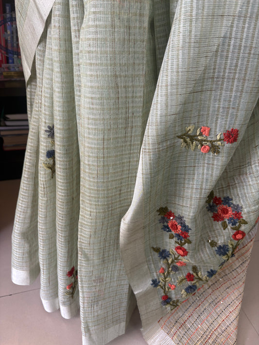 Hand embroidery on Kota tissue silk saree