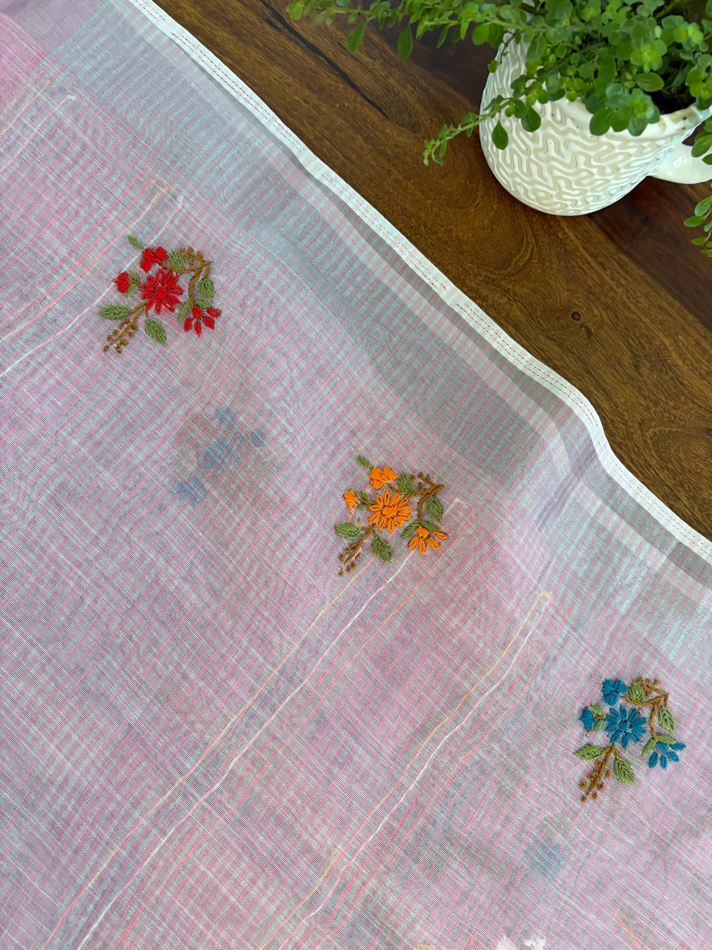 Hand embroidery on linen tissue silk saree