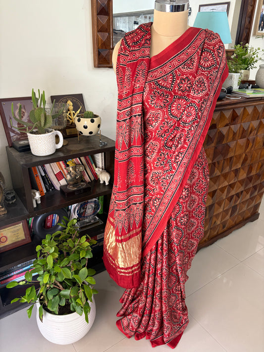 Ajrakh Handblock printed Modal silk saree with lagdi pallu