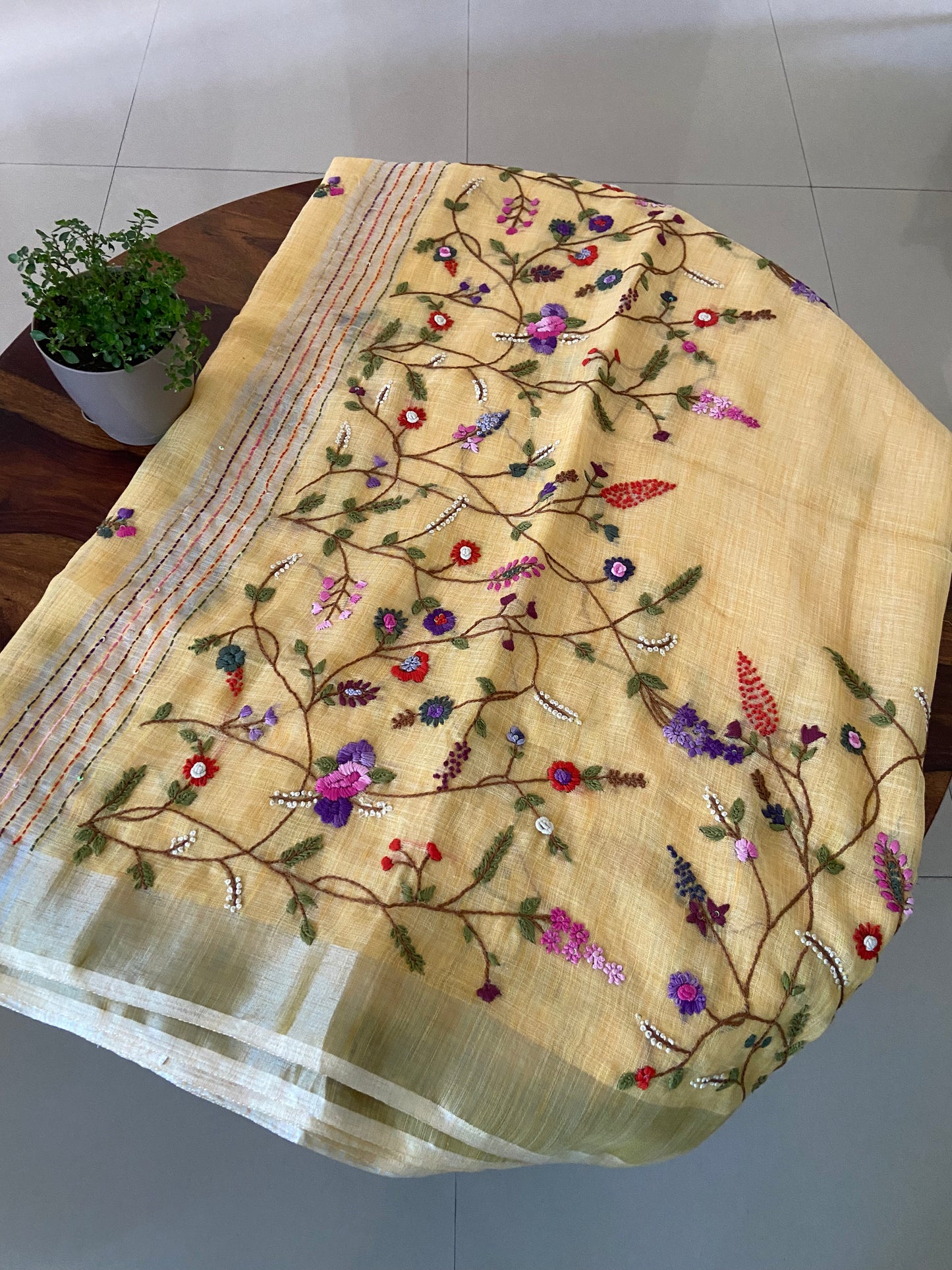 Hand bullion , Kantha and sequence embroidery on linen tissue saree.