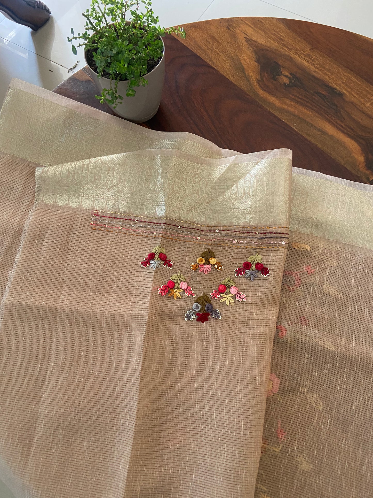 Hand bullion, Kantha, sequence embroidery on Kota tissue silk saree.