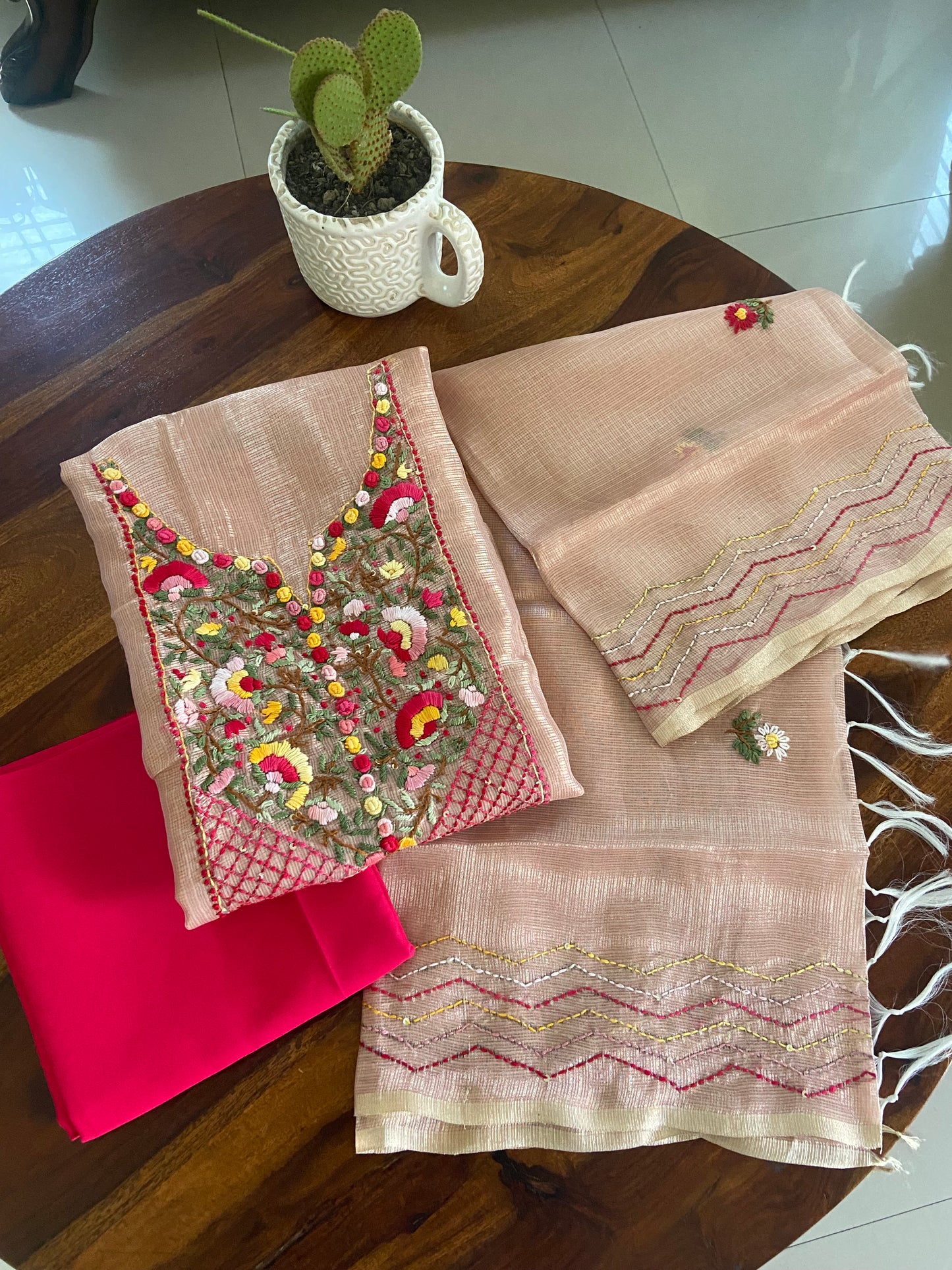Hand embroidery on Kota tissue silk suit top and dupatta with cotton contrast bottom( Peach)
