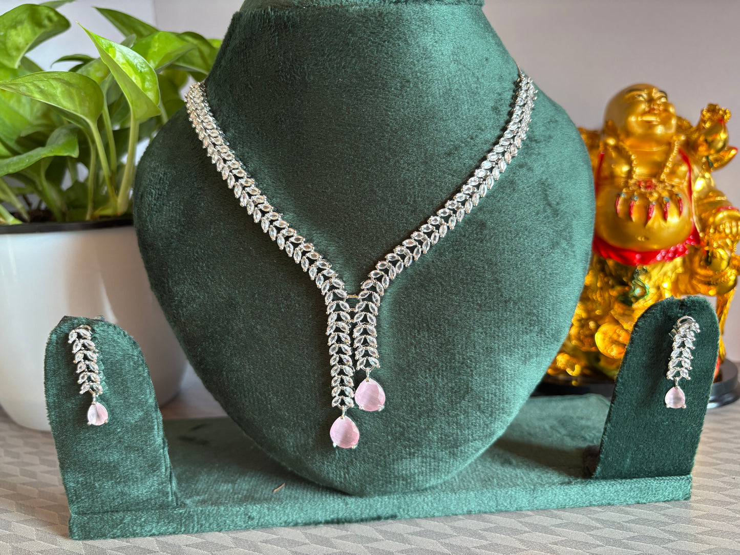 Two layer ad stone with pink pendant