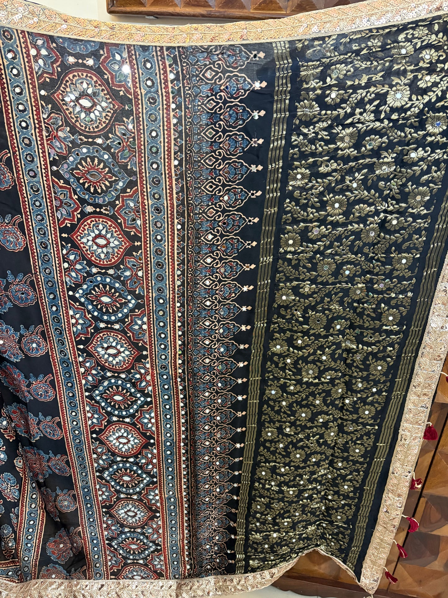 Ajrakh Modal silk saree with zari border and mirror work
