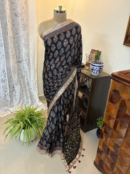 Ajrakh Modal silk saree with zari border and mirror work
