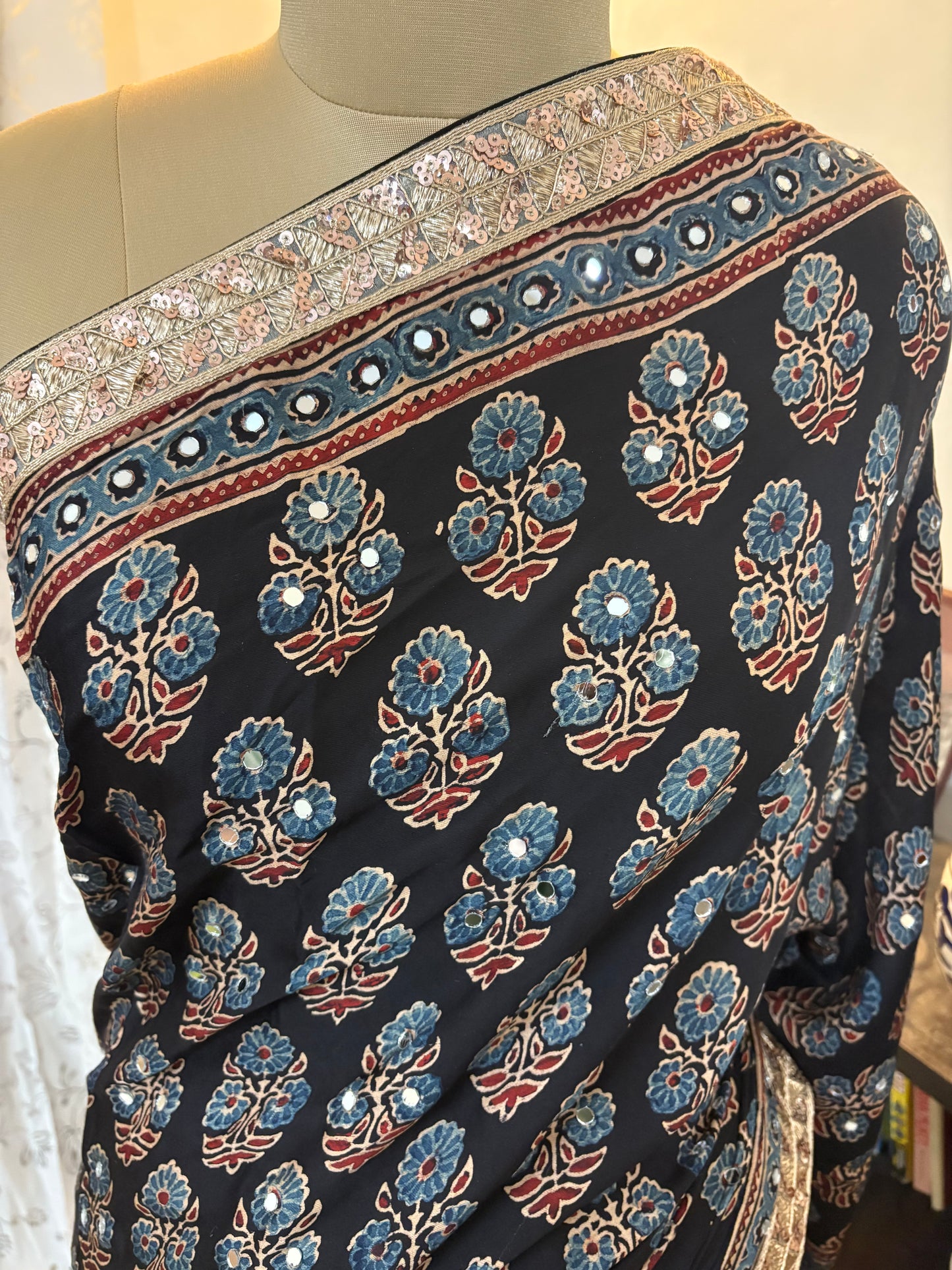 Ajrakh Modal silk saree with zari border and mirror work