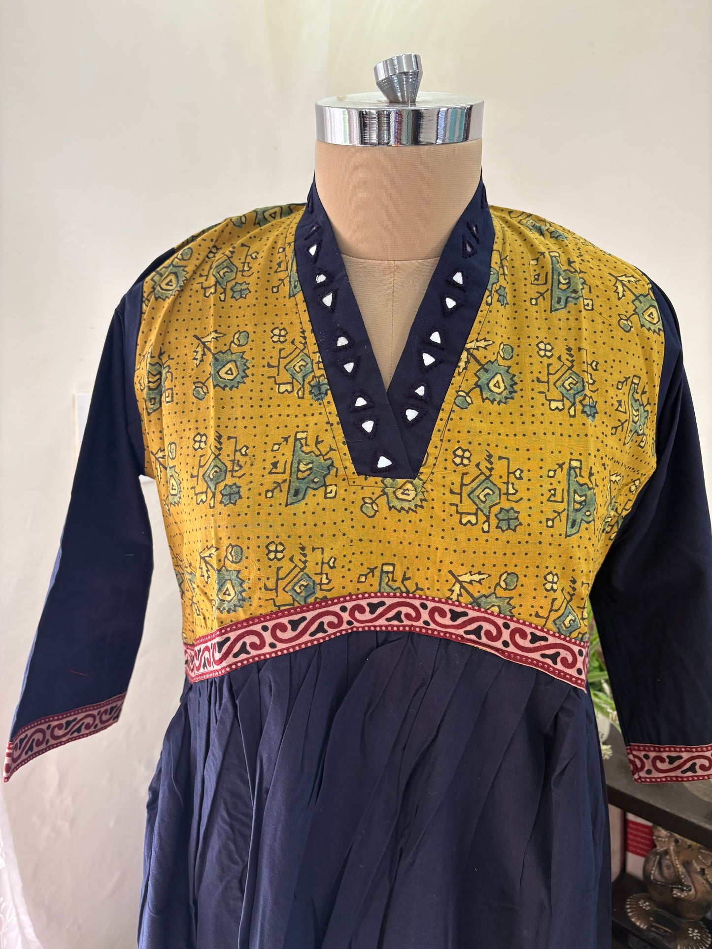 Ajrakh Handblock printed long Kurti with hand mirror work.