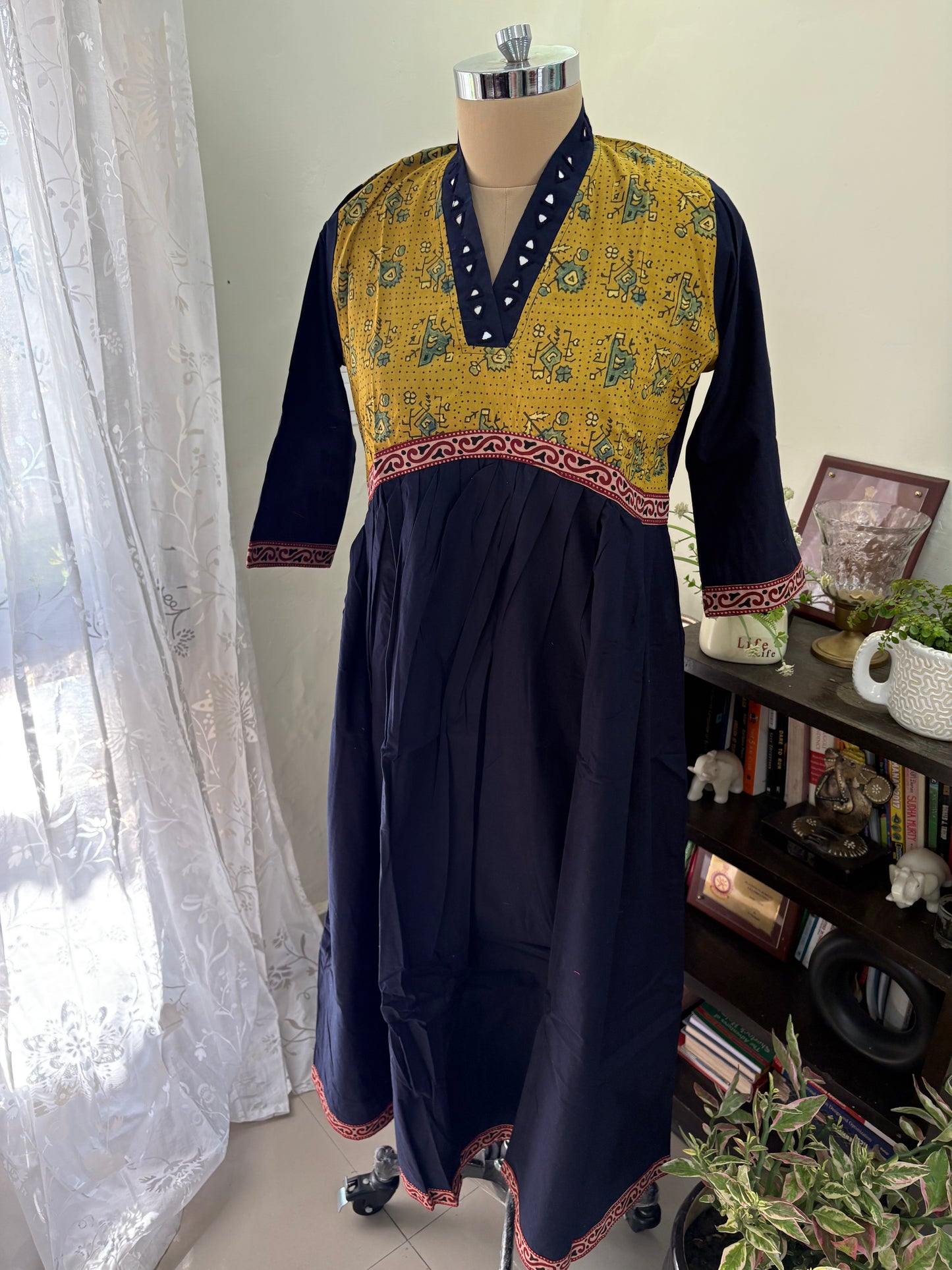 Ajrakh Handblock printed long Kurti with hand mirror work.