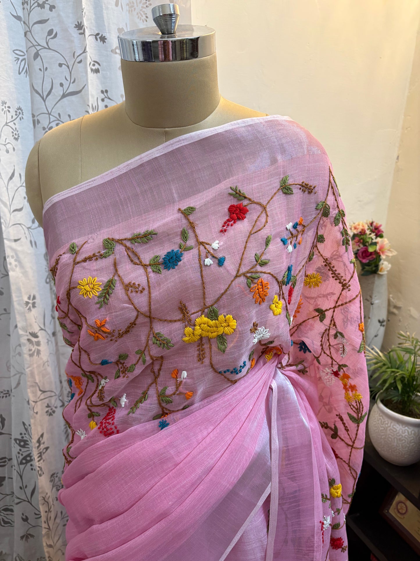 Hand embroidery on linen tissue silk saree