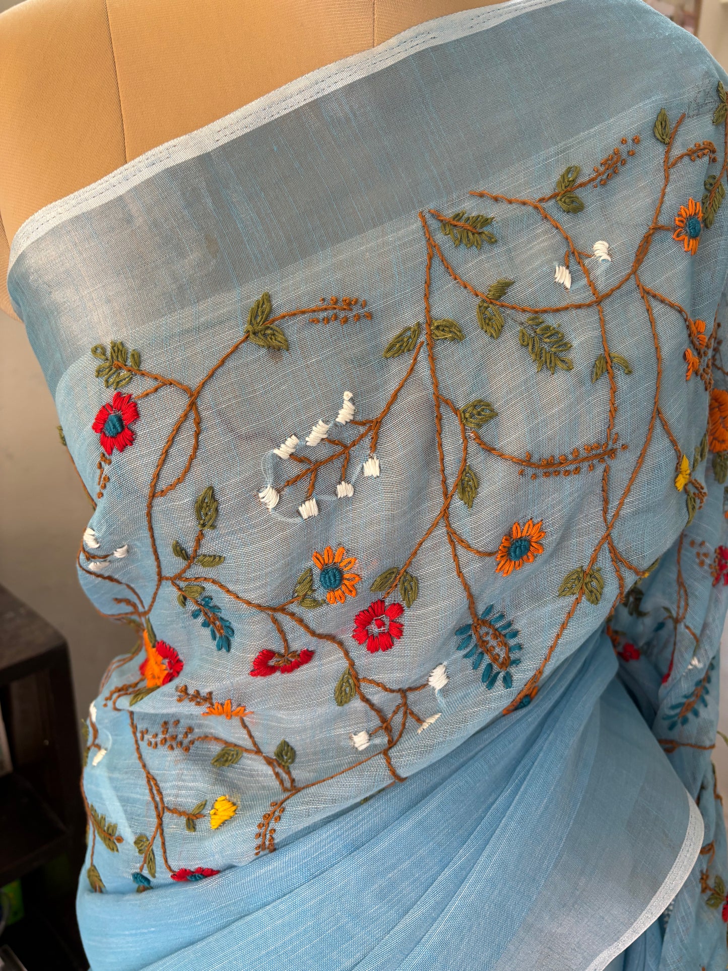 Hand Embroidery on linen tissue silk saree