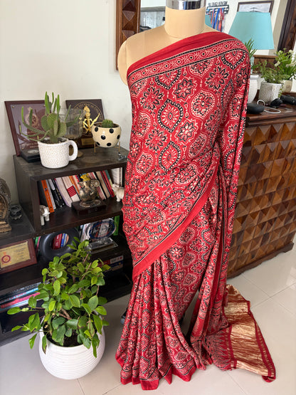 Ajrakh Handblock printed Modal silk saree with lagdi pallu