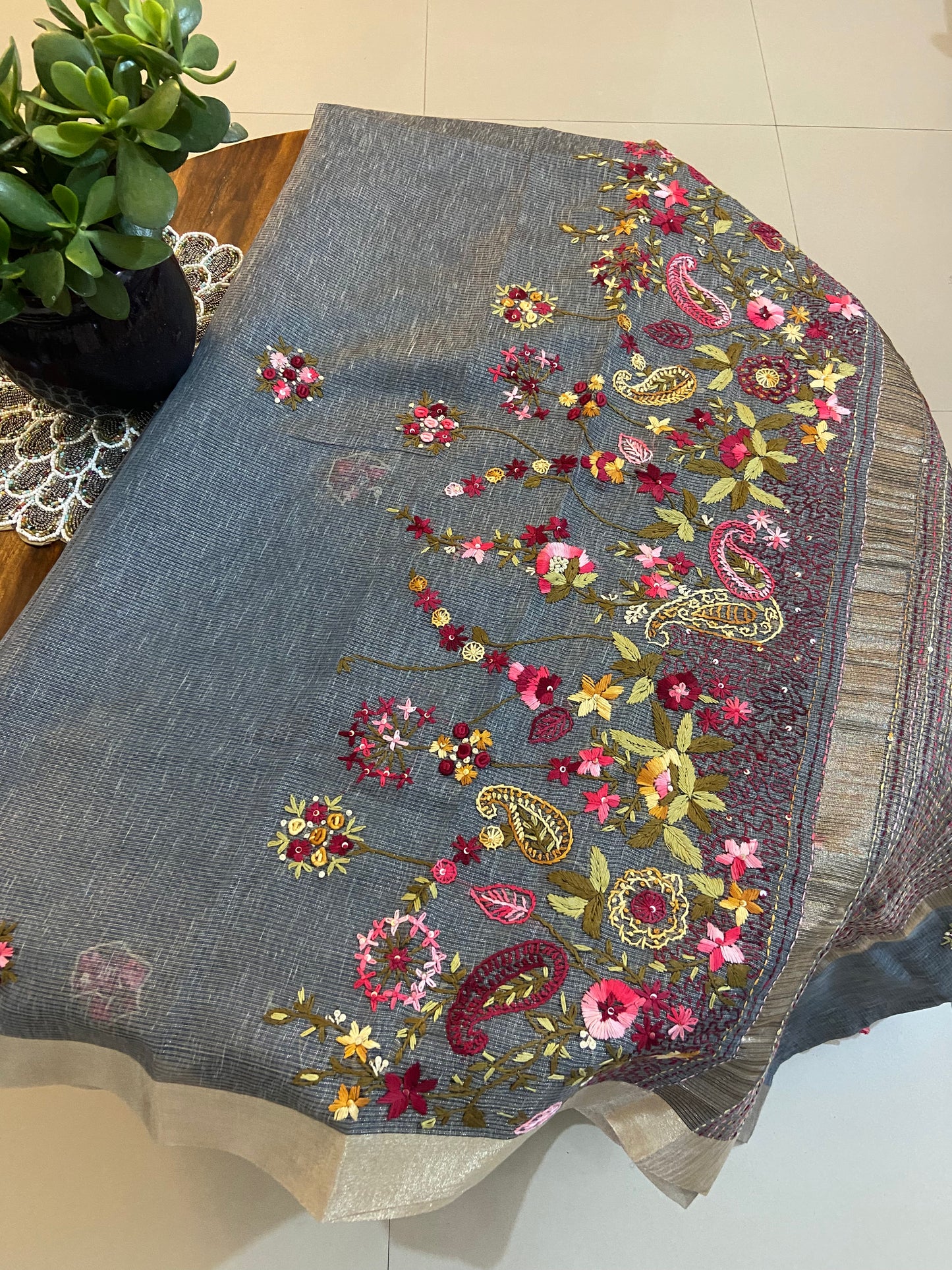 Hand Embroidery on linen tissue silk saree