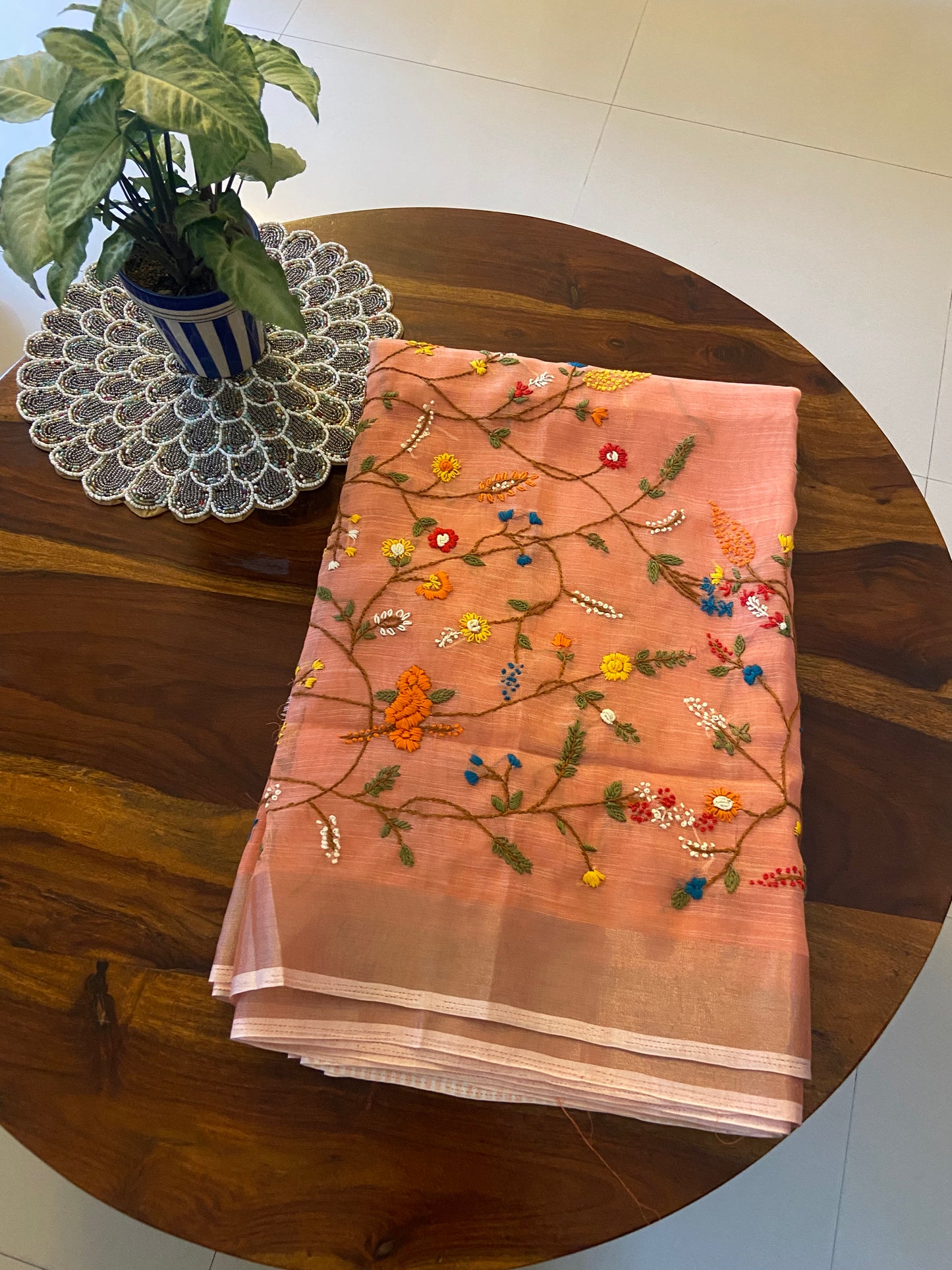 Hand Embroidery on linen tissue silk saree